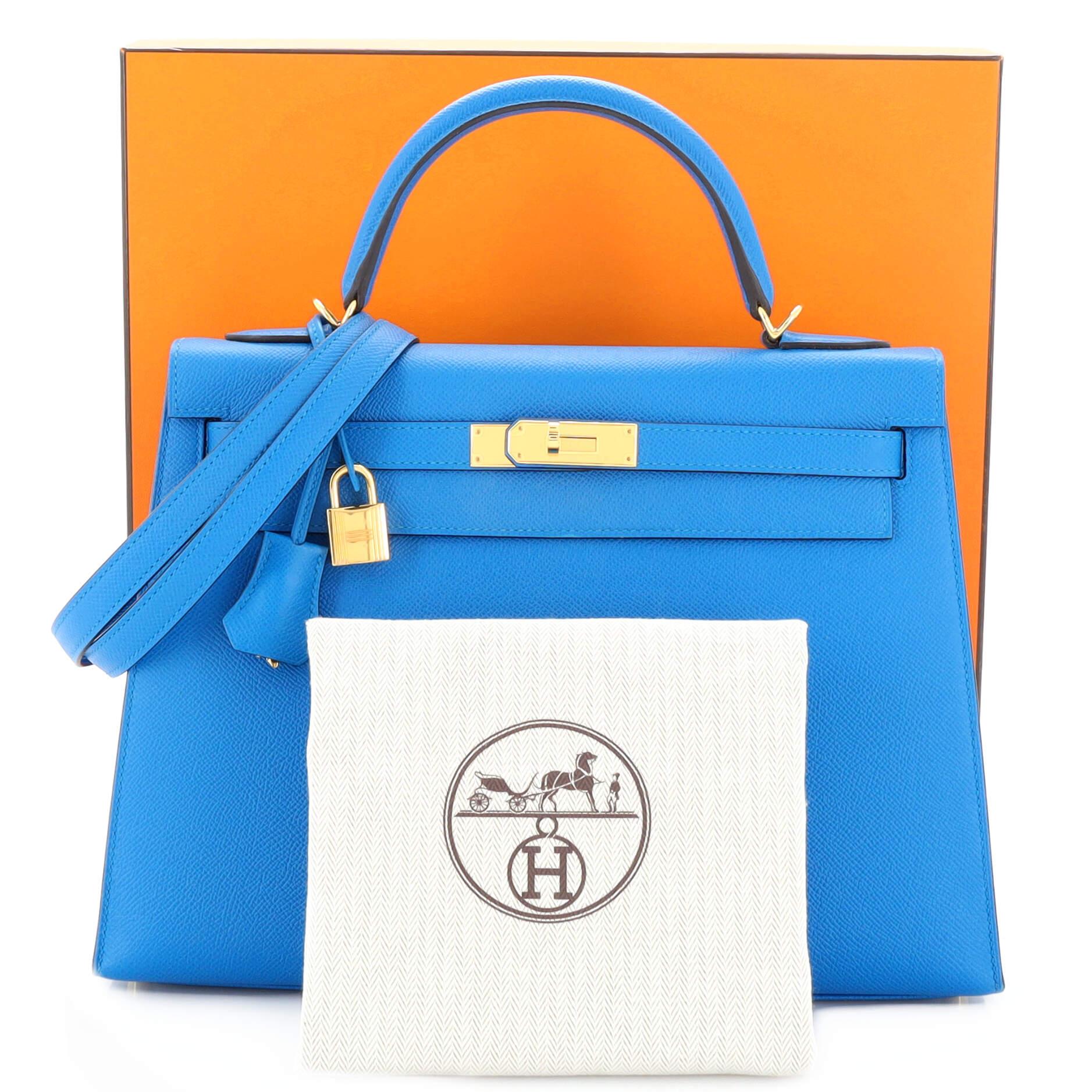 Condition: Great. Minor wear on base corners, handle and strap, light scuffs and indentations in interior. Small mark on interior pocket, scratches on hardware.
Accessories: Keys, Lock, Box, Clochette, Dust Bag, With Strap
Measurements: Height 9