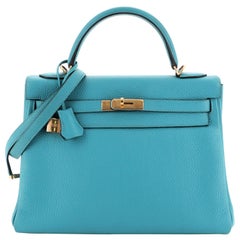 Hermes Kelly Handbag Blue Izmir Clemence with Gold Hardware 32