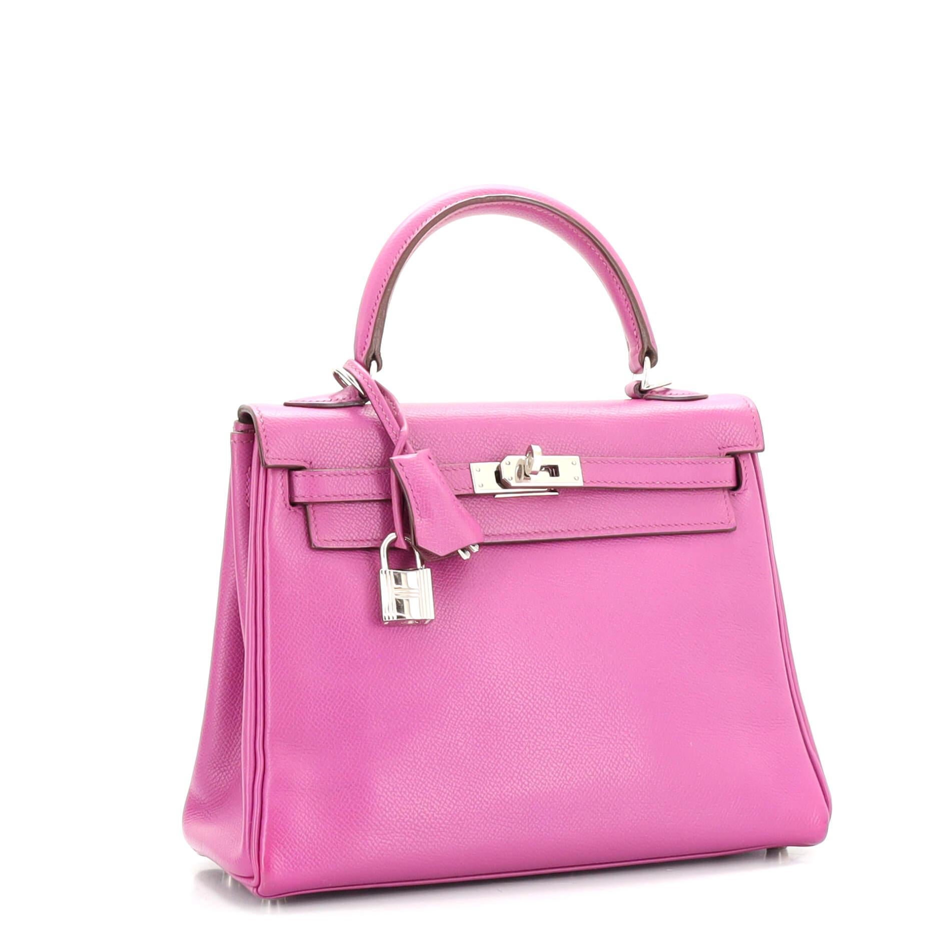 Condition: Marketplace Only. Odor in interior. Repainted exterior and handle, loose turn lock. Wear, scuffs and creasing on exterior, handle, strap, heavy splitting on clochette, flap opening corner, belt closure, strap and handle base wax edges,