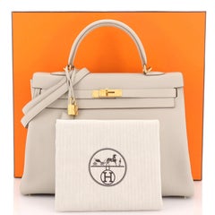 Hermès Kelly Handtasche Gris Perle Togo mit Goldbeschlägen 35