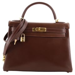 Hermes Kelly Handtasche Havane Box Kalb mit goldener Hardware 32