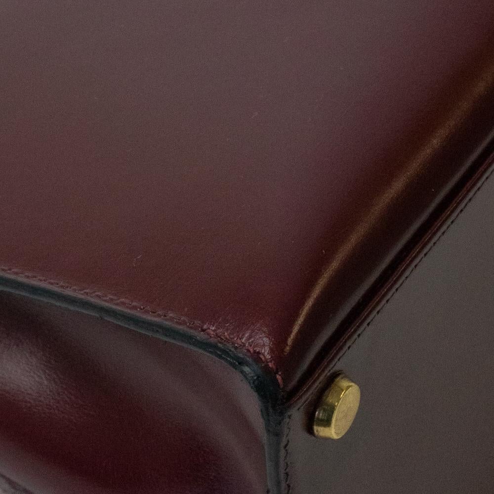 HERMÈS Kelly Handbag in Burgundy Leather 4