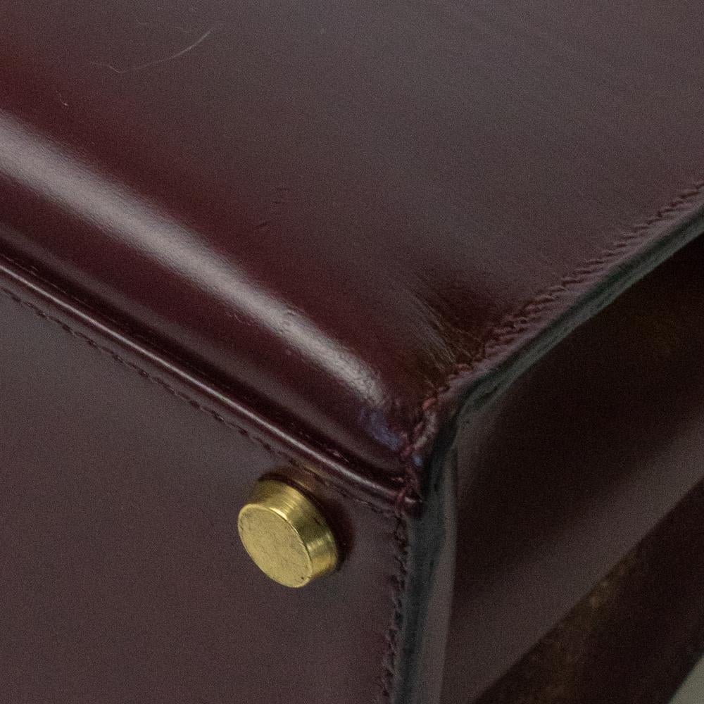 HERMÈS Kelly Handbag in Burgundy Leather 5