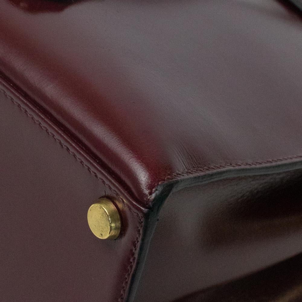 HERMÈS Kelly Handbag in Burgundy Leather 3