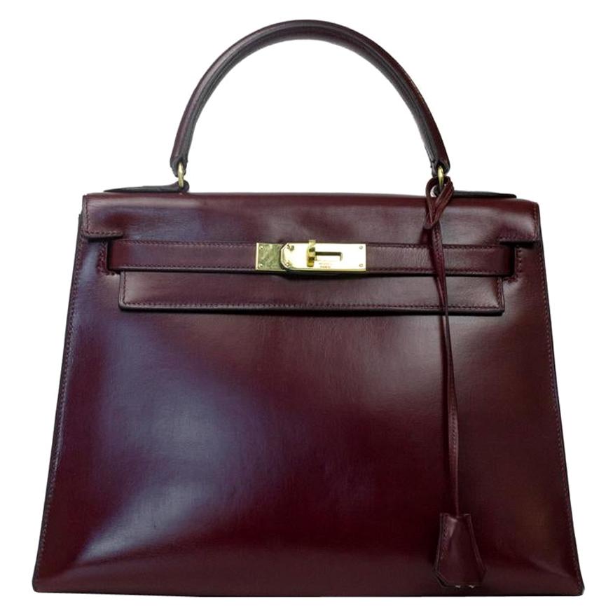 HERMÈS Kelly Handbag in Burgundy Leather