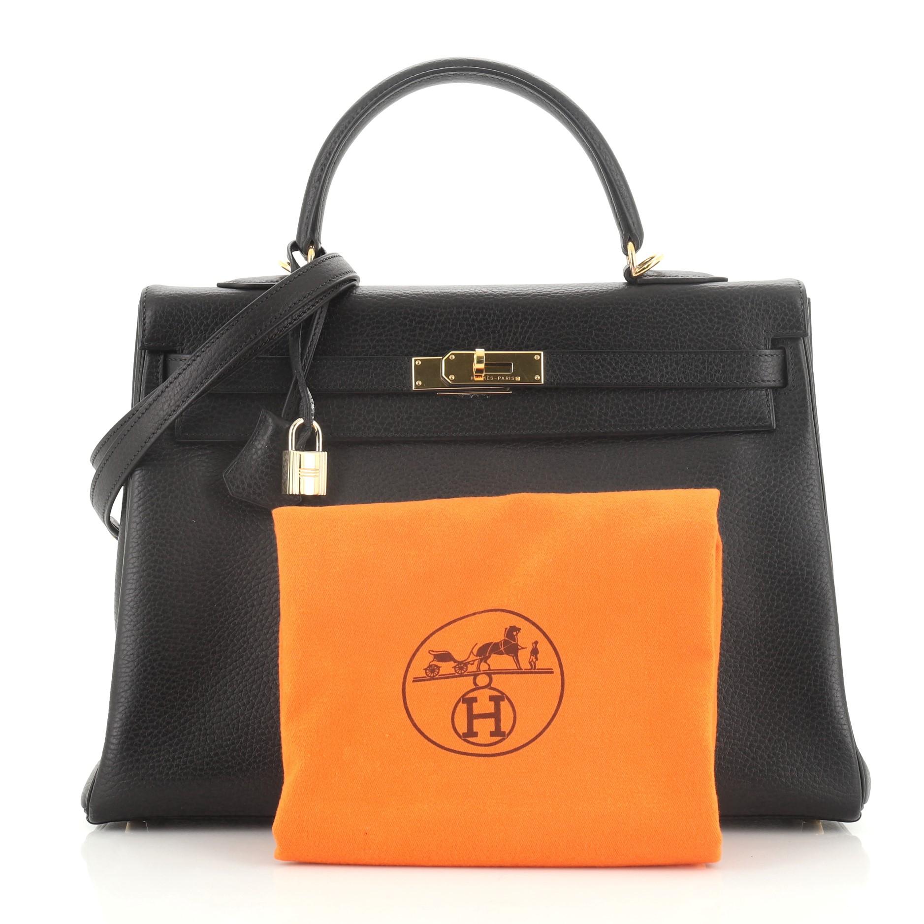 This Hermes Kelly Handbag Noir Ardennes with Gold Hardware 35, crafted in Noir black Ardennes leather, features a single top handle, frontal flap, and gold hardware. Its turn-lock closure opens to a Noir black Chevre leather interior with zip and