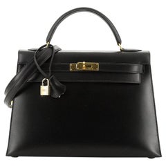 Hermes  Kelly Handbag Noir Box Calf with Gold Hardware 32 E