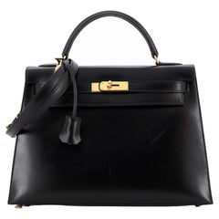 Sac à main Hermès Kelly en cuir de veau avec finitions dorées, taille 32