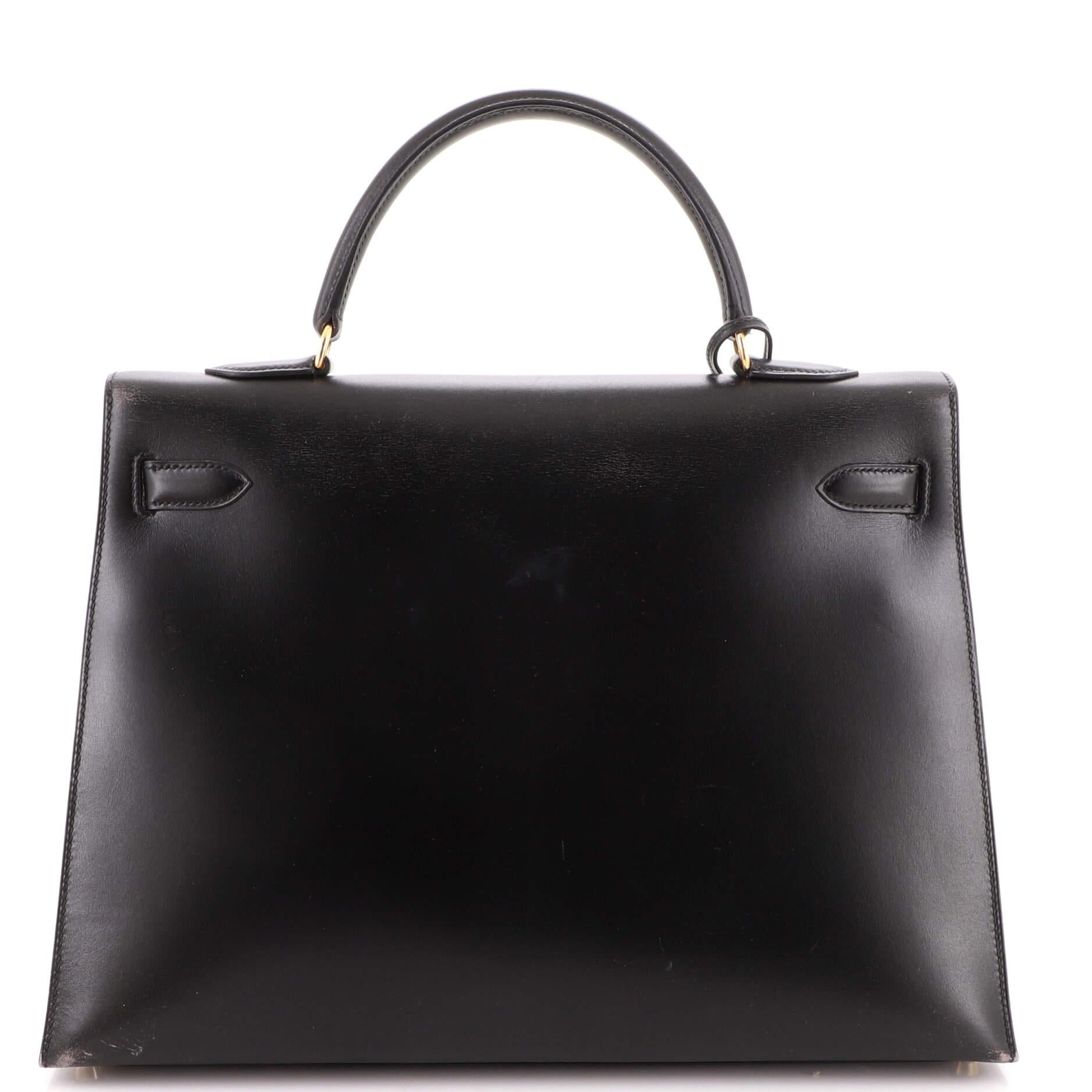 Women's or Men's Hermes Kelly Handbag Noir Box Calf with Gold Hardware 35 For Sale