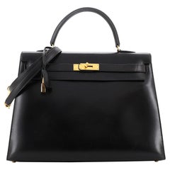 Sac à main Hermès Kelly en cuir de veau avec finitions dorées, taille 35 Sac à main Hermès Kelly en cuir de veau avec finitions dorées, taille 35