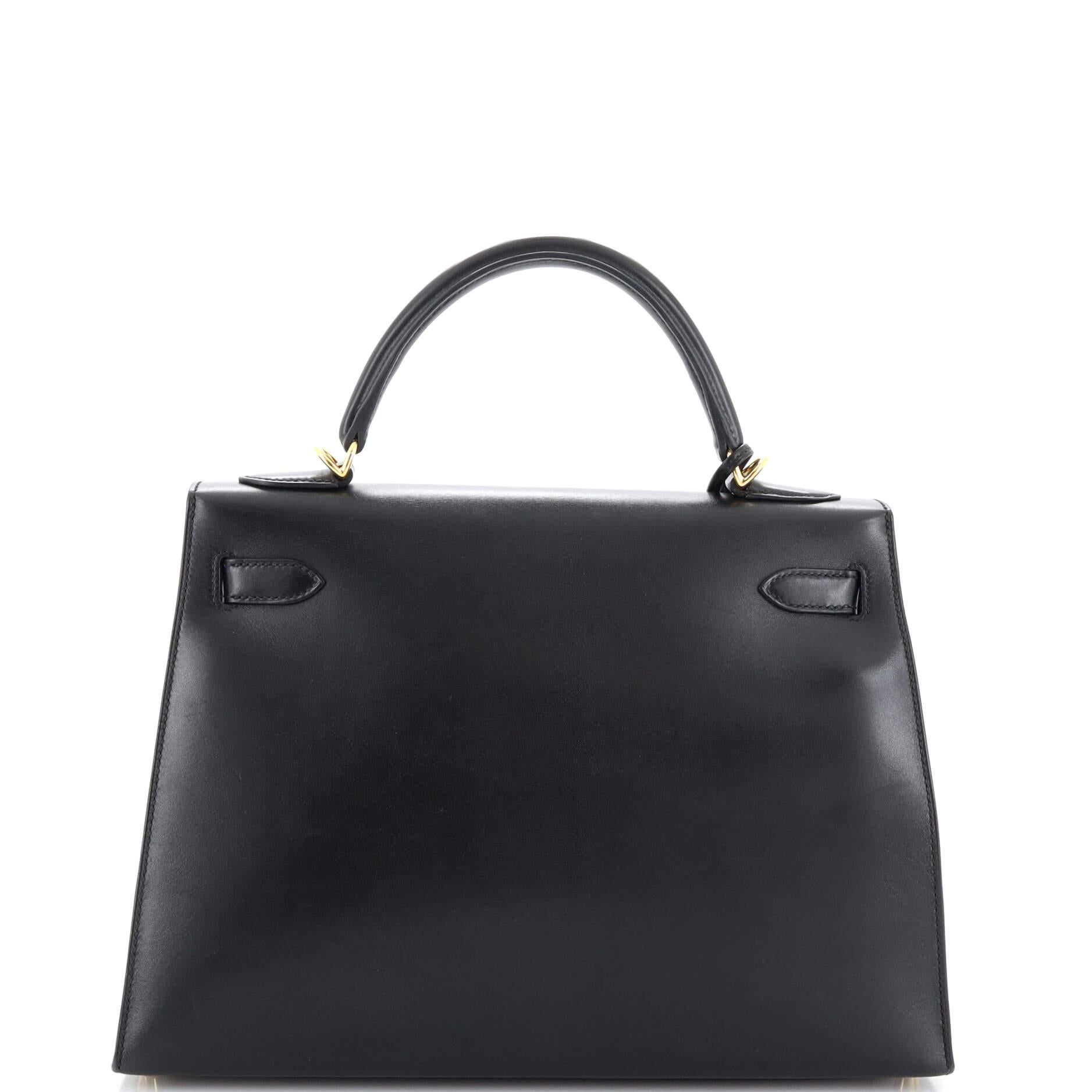 Women's or Men's Hermes Kelly Handbag Noir Tadelakt with Gold Hardware 32 For Sale