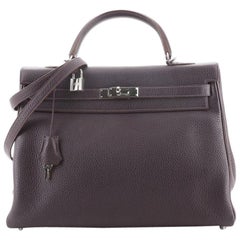 Hermes Kelly Handbag Raisin Clemence with Palladium Hardware 35