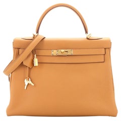 Hermes Kelly Handbag Sesame Clemence with Gold Hardware 32