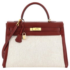 Hermes Kelly 20 Bi-Color Mini Sellier Bag Havane / Etrusque Chevre Pal –  Mightychic