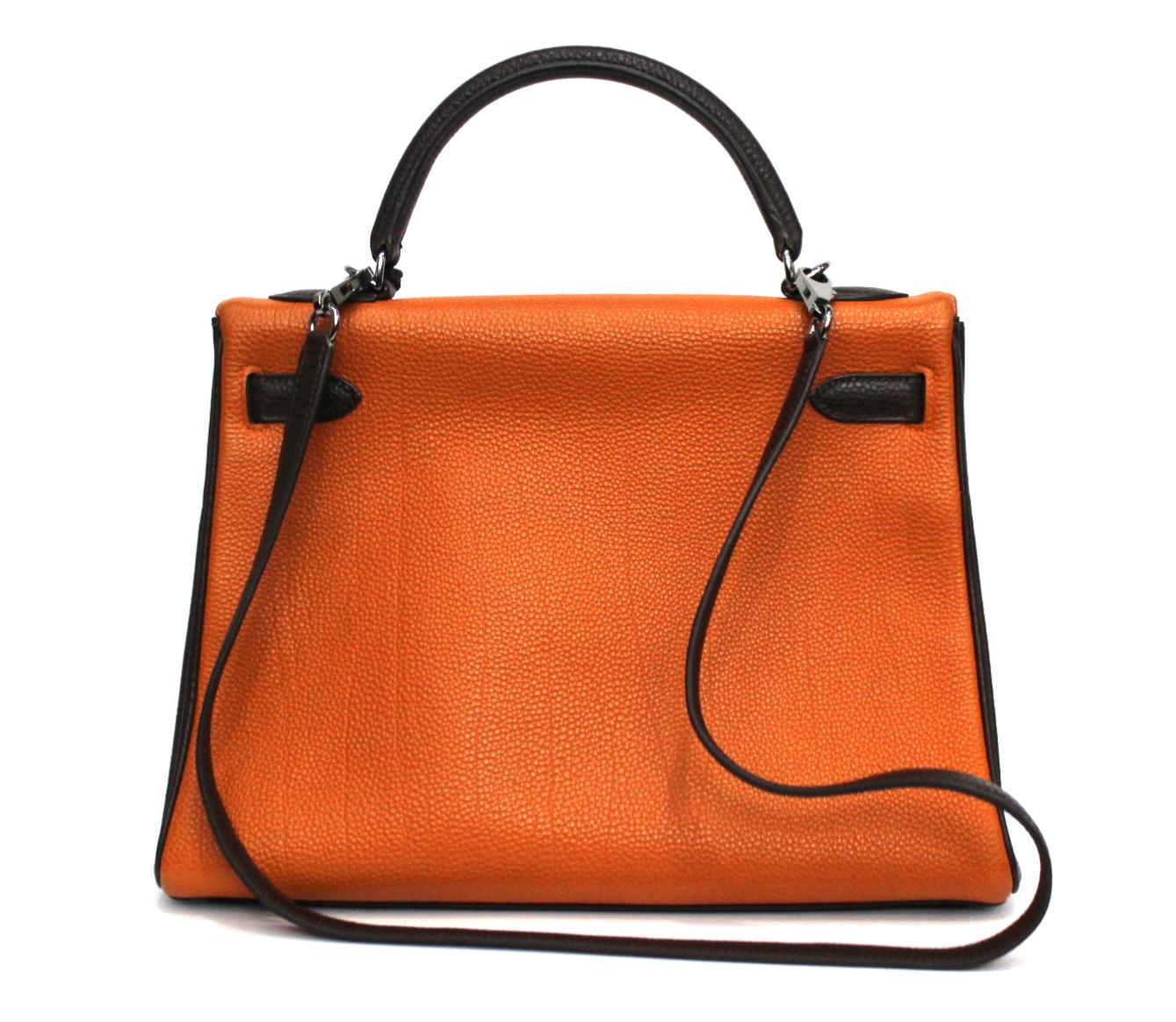 This fantastic Hermes Kelly Tricolor Togo in size 32 is constructed with scratch-resistant Togo leather in striking blood orange front, tangerine back, and chocolate brown sides and trimming. Accented with polished Palladium hardware and silver