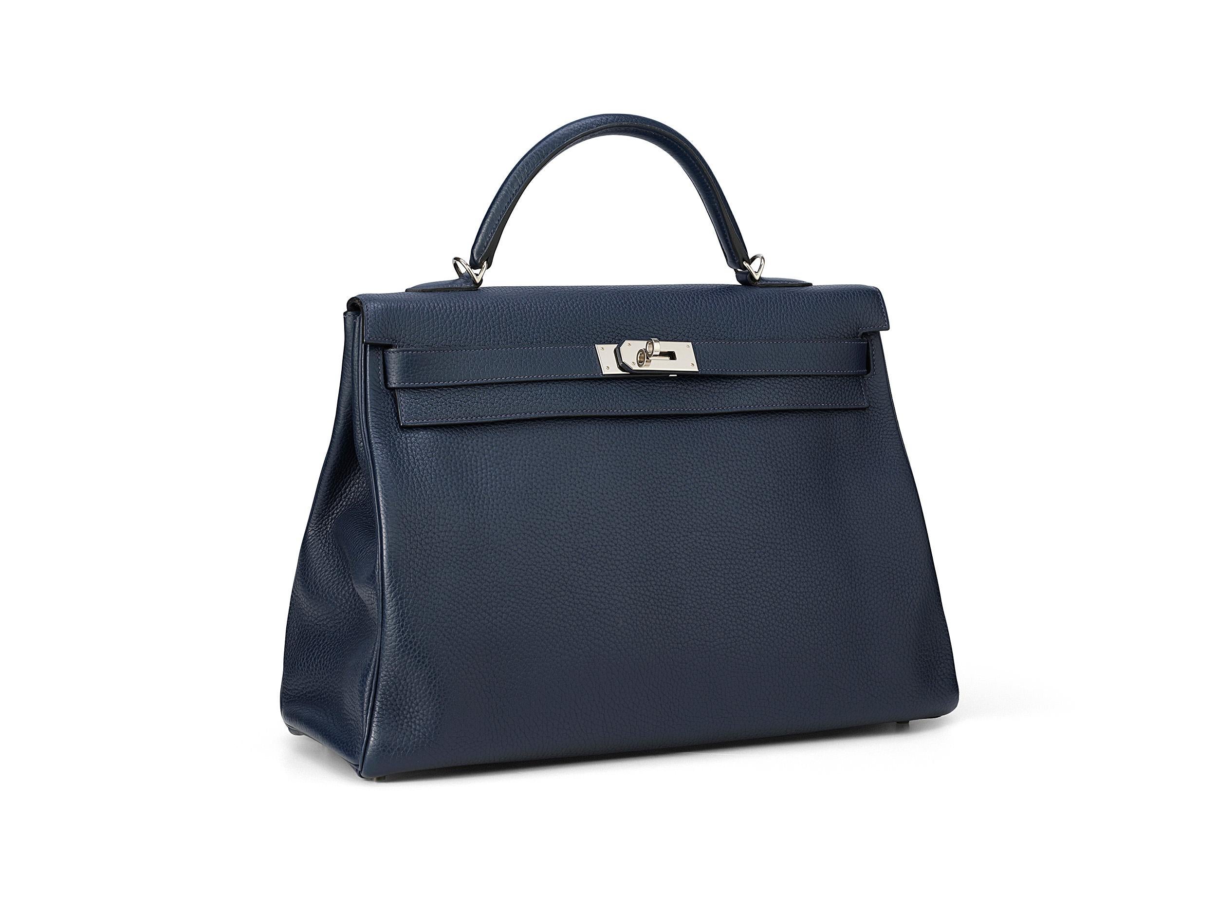 Hermès Kelly HSS 40 in bleu nuit and taurillon clemence leather with palladium hardware. The bag is in excellent condition with minimal marks and comes as full set. 

Bags with a horse shoe stamp (HSS) are customized for special clients.

Stamp A