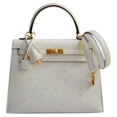 Hermès Kelly II 25 Nata Avestruz Sellier Boréale Herraje de Oro Sello G 2026