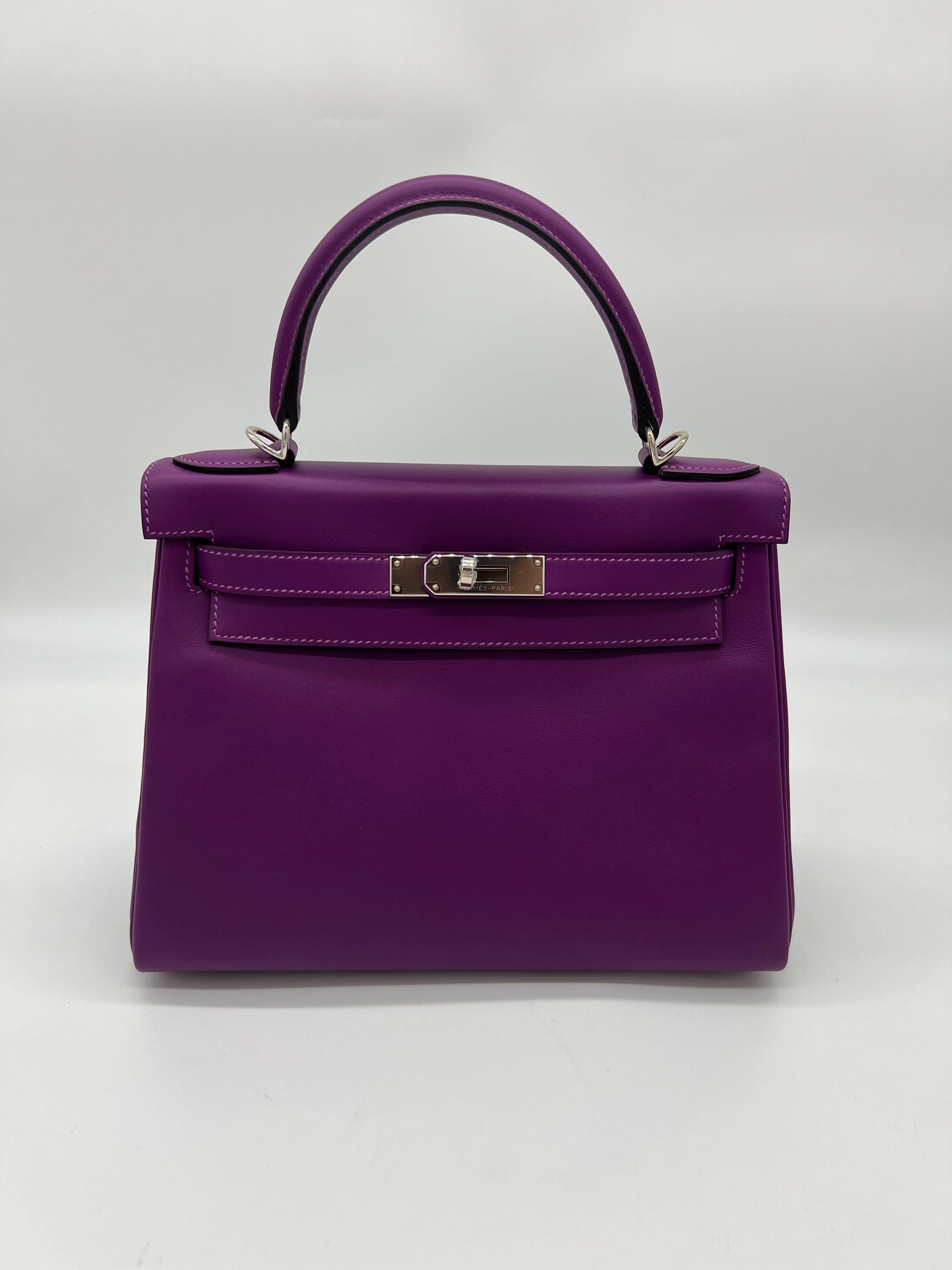 Hermes Kelly II Retourne 28 Veau Swift Anemone, Palladium Hardware

Condition: Brand New 
Material: Swift Leather
Measurements: (W)28cm × (H)22cm × (D)11.5cm
Hardware: Palladium plated
 
*Comes in full original packaging. 
*Includes original Hermes