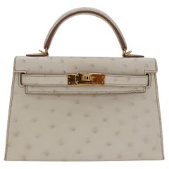 Hermès Kelly II Sellier Mini Beton Ostrich Gold Hardware