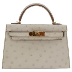 Hermès Kelly II Sellier Mini Beton Ostrich Leather With Gold Hardware Handbag