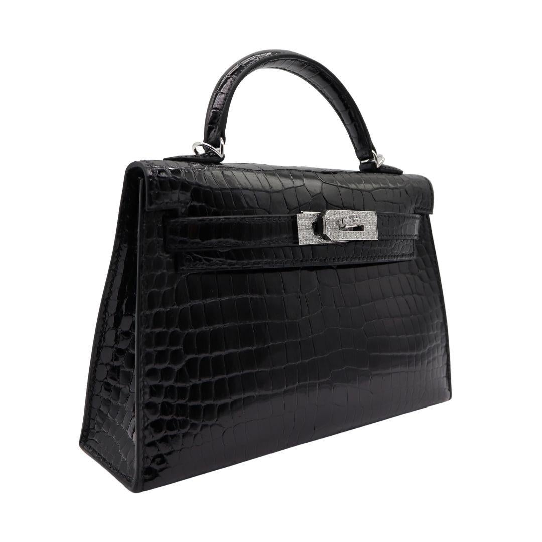Brand: Hermès
Style: Kelly II Sellier Mini
Size: 20cm
Color: Black
Material: Porosus Crocodile
Hardware: Diamond Hardware
Dimensions: 7.5