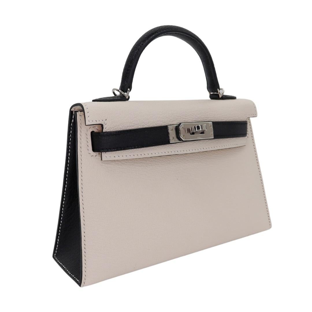 Brand: Hermès
Style: Kelly II Sellier Mini
Size: 20cm
Color: Nata/Black
Material: Chèvre Leather
Hardware: Palladium Hardware (PHW)
Dimensions: 7.5