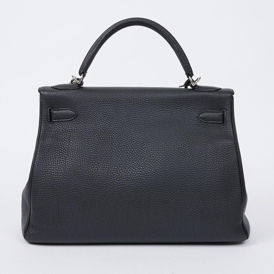 HERMES Kelly In Black Togo Leather With Removable Strap In Excellent Condition In Paris, FR