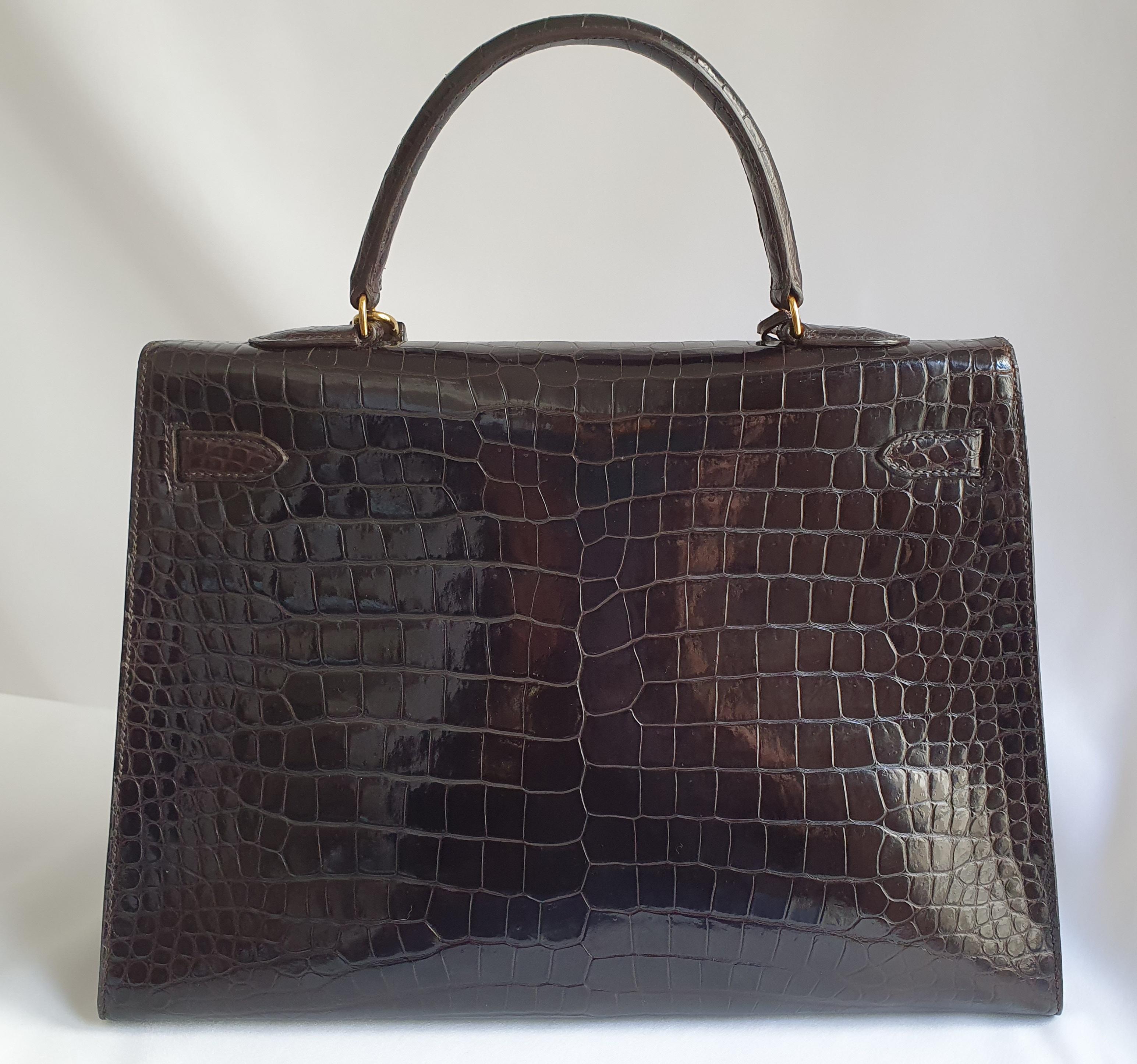 Black Hermès, Kelly in brown Porosus Crocodile