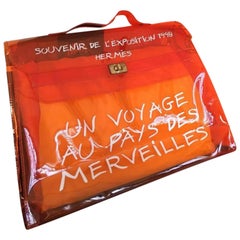 Hermès Kelly L'exposition Clear Souvenir 230299 Orange Vinyl Tote