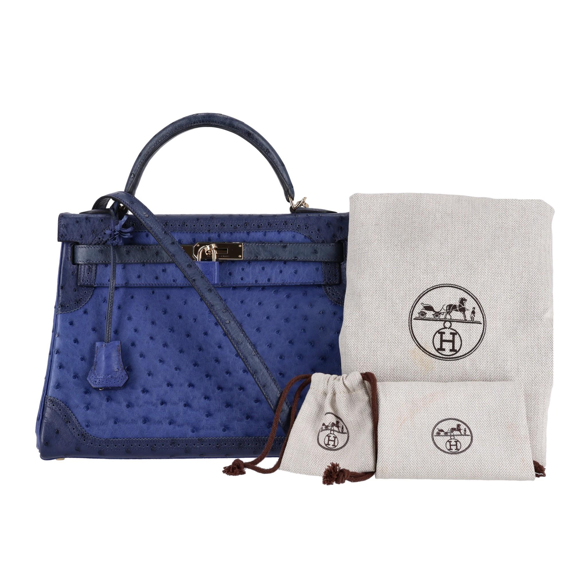 Hermes Kelly Ltd Edition Ghillies Bag In Ostrich Skin 

Very rare bag, in blue sapphire, blue malte, and blue iris with gold hardware.

Keys, clochette and removable shoulder strap. Rrp £35,000

Date stamp 2014.

Size - Height 20cm, Width 32cm,