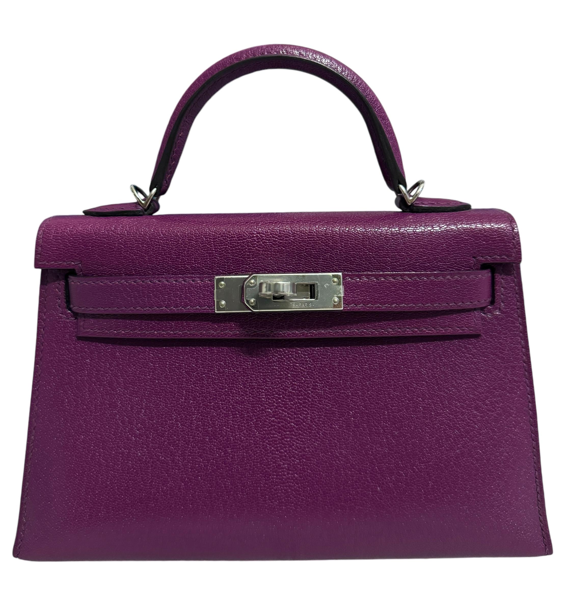 Ultra Rare and Hardest to get Hermes Mini Kelly 20 Anemone Chèvre Leather Complimented by Palladium Hardware. Pristine Condition, Like New Plastic on all Hardware. Only Worn a 1 Time. Y Stamp 2020. From Collectors closet. 

Please keep in mind that