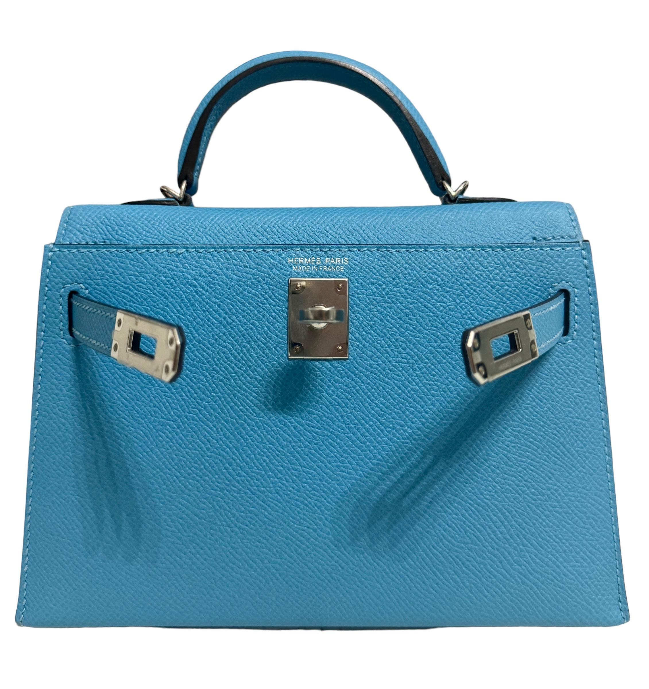 As New Ultra Rare and Hardest to get Hermes Mini Kelly 20 Bleu du Nord Epsom Leather Complimented by Palladium Hardware. 2019 D Stamp. Includes all Accessories and Box. Please be aware the bag may have minor hairlines on interior due to being