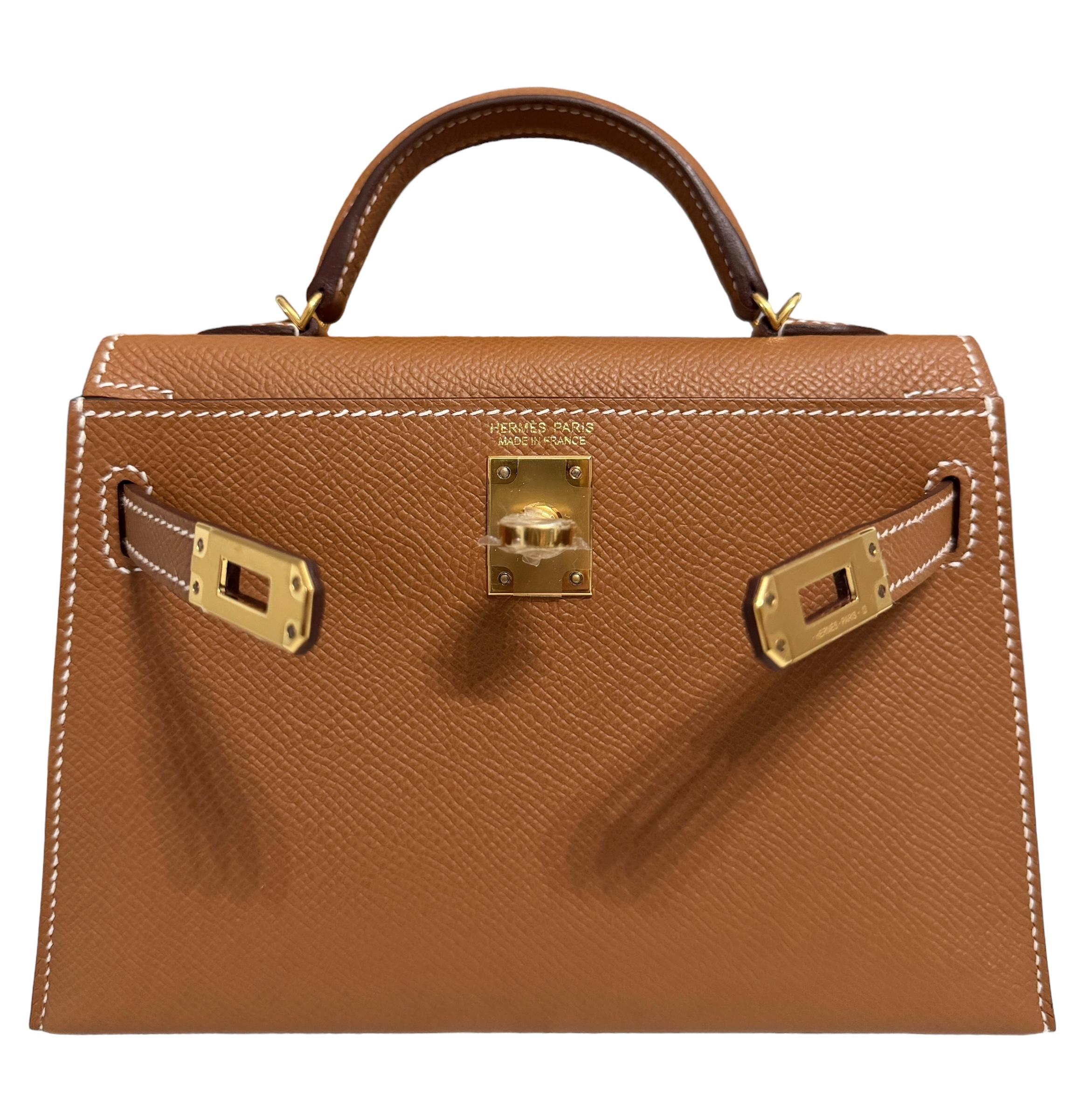 As New Ultra Rare and Hardest to get Hermes Mini Kelly 20 Gold Epsom Leather Complimented by Gold Hardware. U Stamp 2022. Includes all Accessories and Box.

Shop with Confidence from Lux Addicts. Authenticity Guaranteed!

Lux Addicts is a Premier