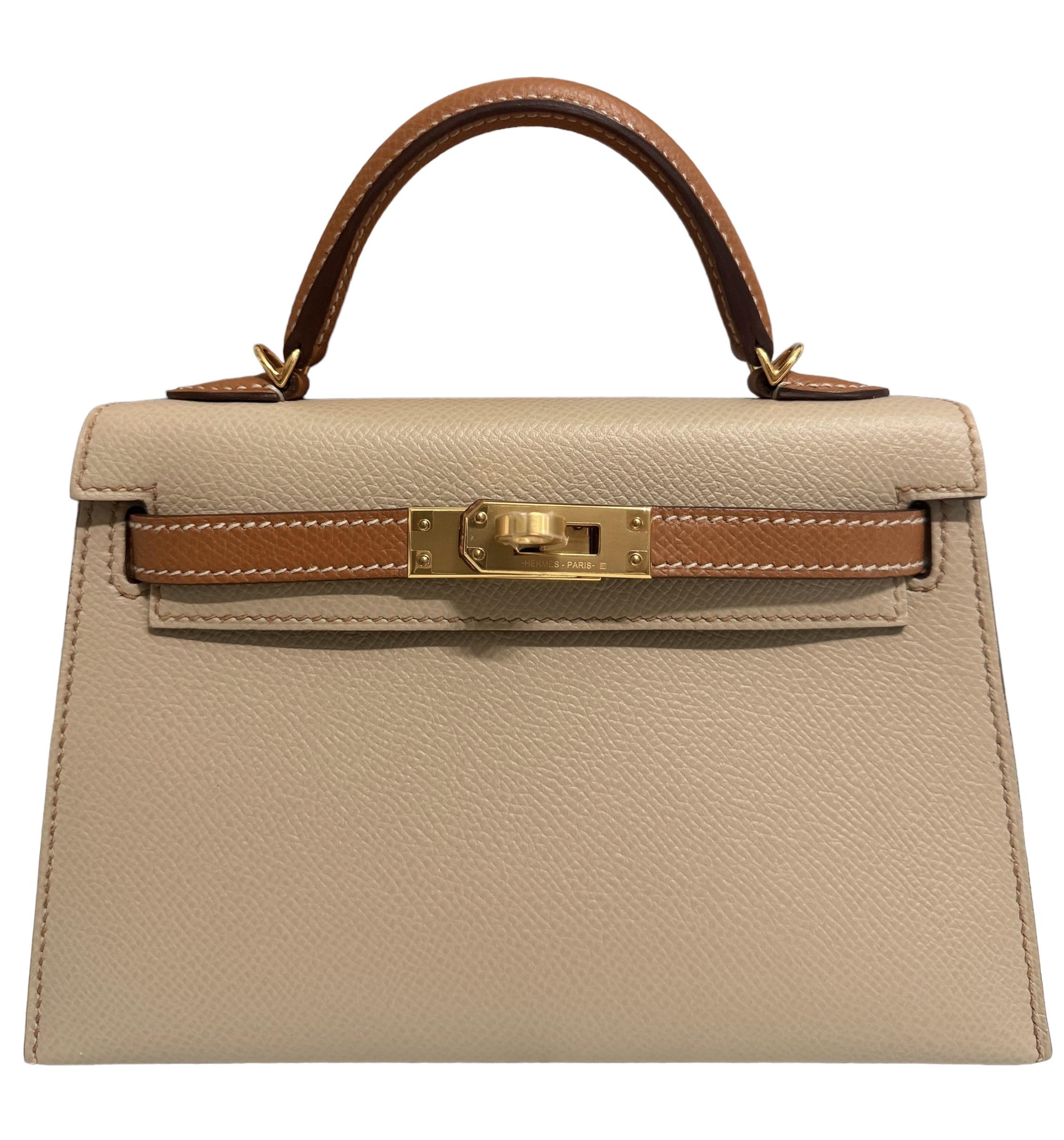 As New Ultra Rare and Hardest to get 1 of 1 Special Order Hermes Mini Kelly 20 Trench & Gold Epsom Leather Complimented by Gold Hardware. Z Stamp 2021. Includes all Accessories and Box.May have Minor Hairline Marks inside from strap being stored