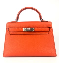 Hermes Kelly Mini 20 Verso Feu Orange Rose Eglantine Chèvre Cuero Palladium