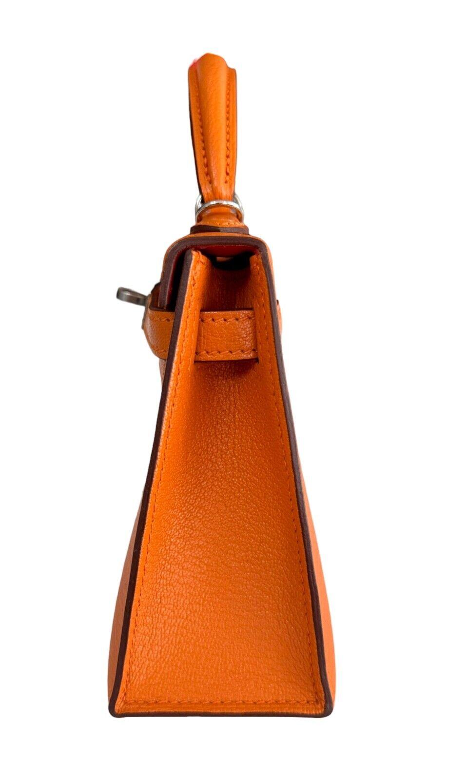 Women's or Men's Hermes Kelly Mini 20 Verso Orange & Sanguine Chèvre Leather Palladium Hardware   For Sale