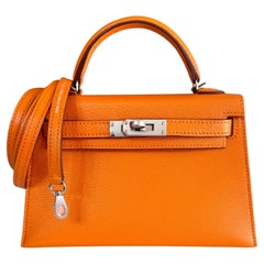 Hermes Kelly Mini 20 Verso Orange & Sanguine Chèvre Leather Palladium Hardware  