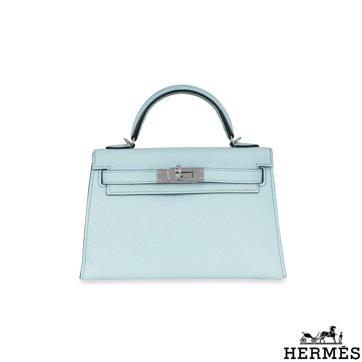 A lovely Hermès Kelly Mini II handbag. The exterior of this Kelly Mini features Bleu Zephyr Veau Epsom leather and is complemented by palladium hardware and tonal stitchings. It has a front toggle closure with two straps, a single rolled handle and