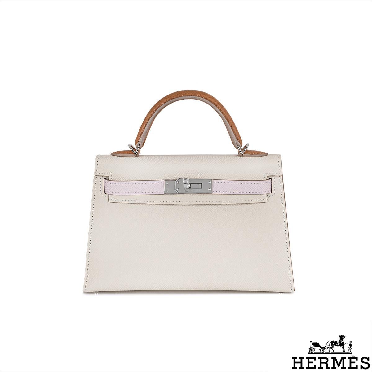 A gorgeous Hermès Kelly Mini II Tricolore Verso handbag. The exterior of this Kelly Mini features Craie, Mauve Pale and Gold Veau Epsom leather and is complemented by palladium hardware and tonal stitchings. It has a front toggle closure with two