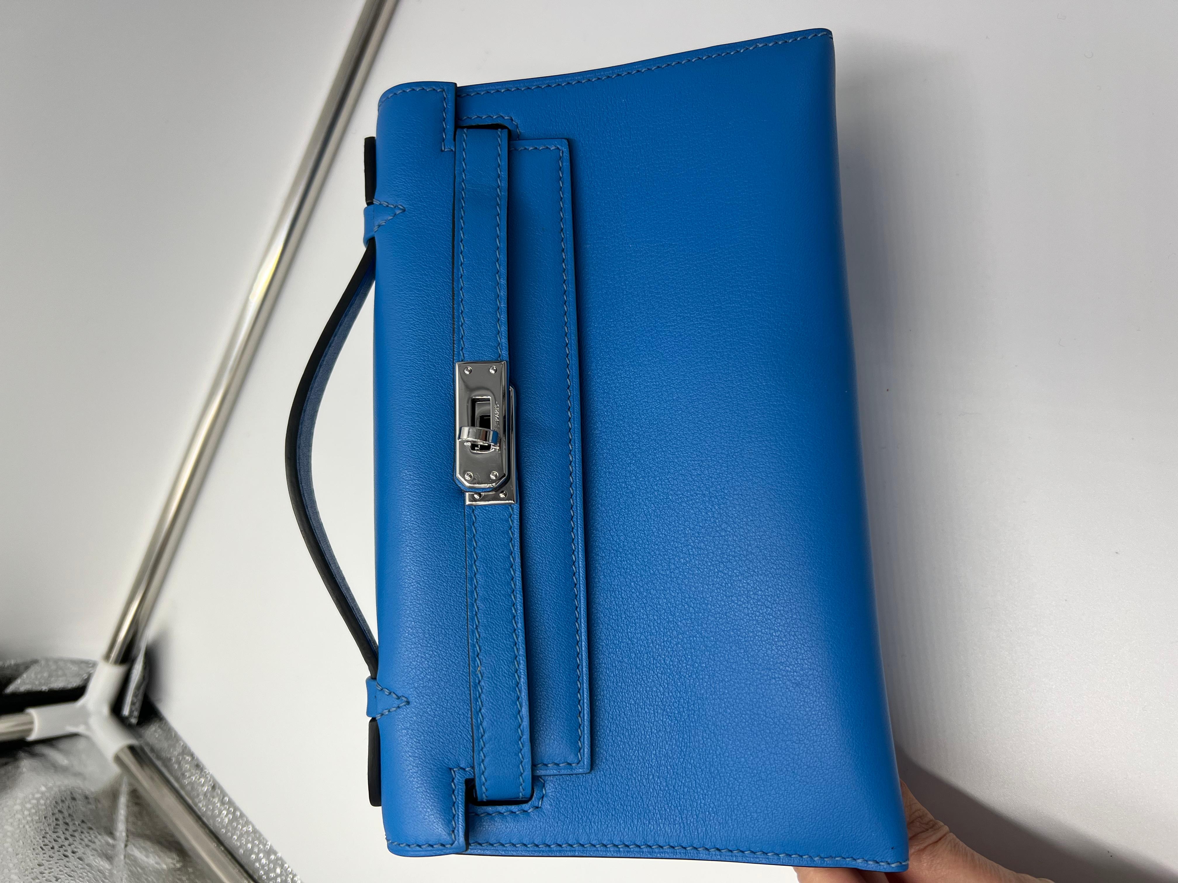 Hermes Kelly mini pochette swift Blue France PHw z stamp. Comes with dustbag and box