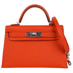 Hermes Kelly Mini Sellier 20 Tasche Orange Feu / Rose Eglantine Chevre Bi-Color