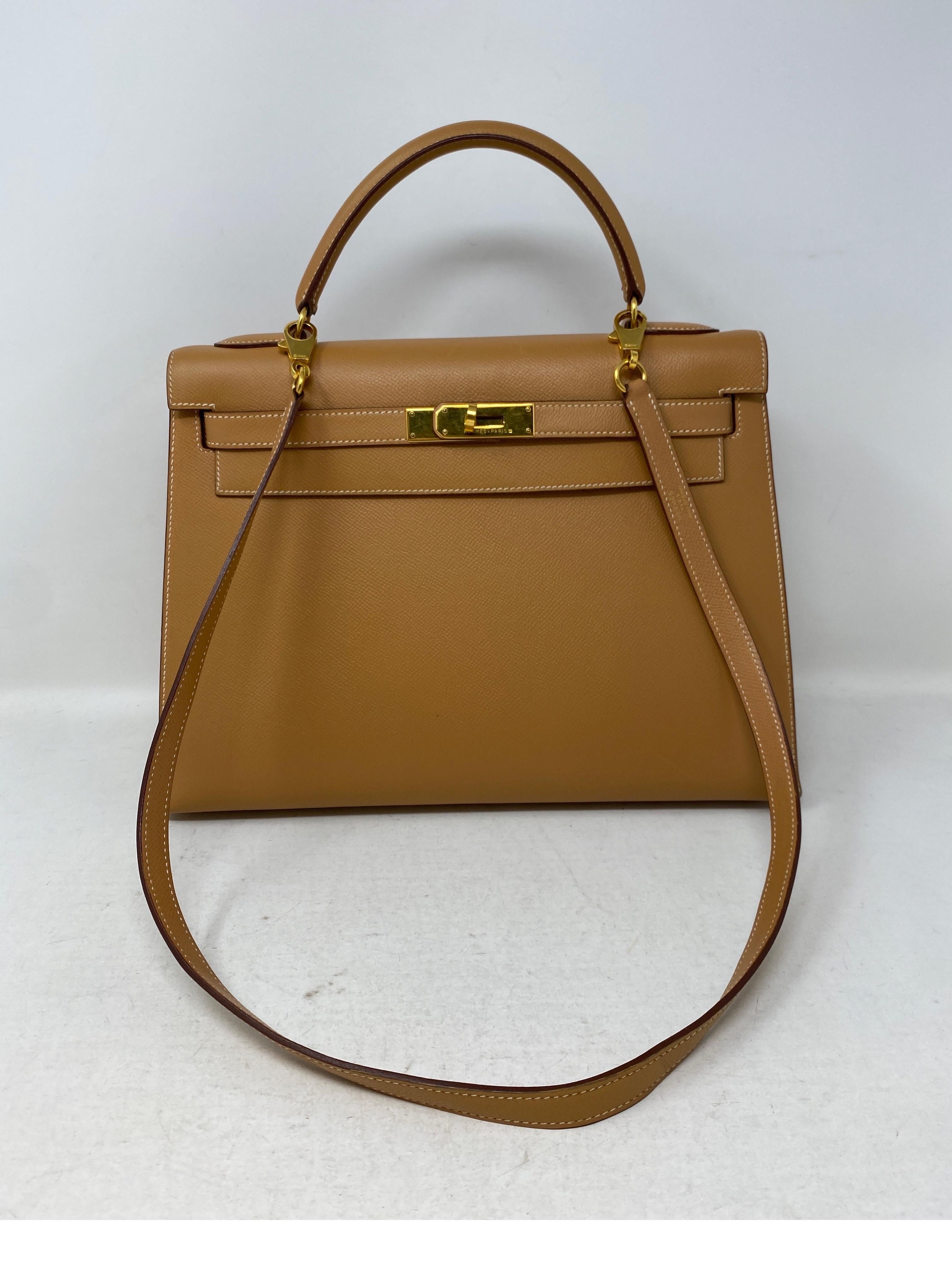 Hermes Kelly Sellier 32 Bag. Excellent condition. Gorgeous Kelly Bag. Rare size 32. Natural tan color. Gold hardware. Sellier is rare and sought after. Keeps it's shape nicely. Great investment bag. Don't miss out on this one. Includes clochette,
