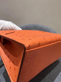 Hermès Kelly Ostrich Pochette GHW Orange GHW in Excellent Condition