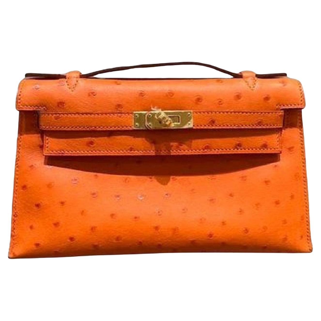 Hermès Kelly Ostrich Pochette GHW Orange GHW in Excellent Condition For Sale
