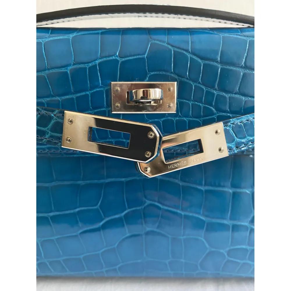 Hermès Kelly pochette petrol blue silver hardware alligator  In Good Condition In Capri, IT