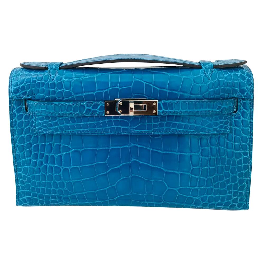 Hermès Kelly pochette petrol blue silver hardware alligator 