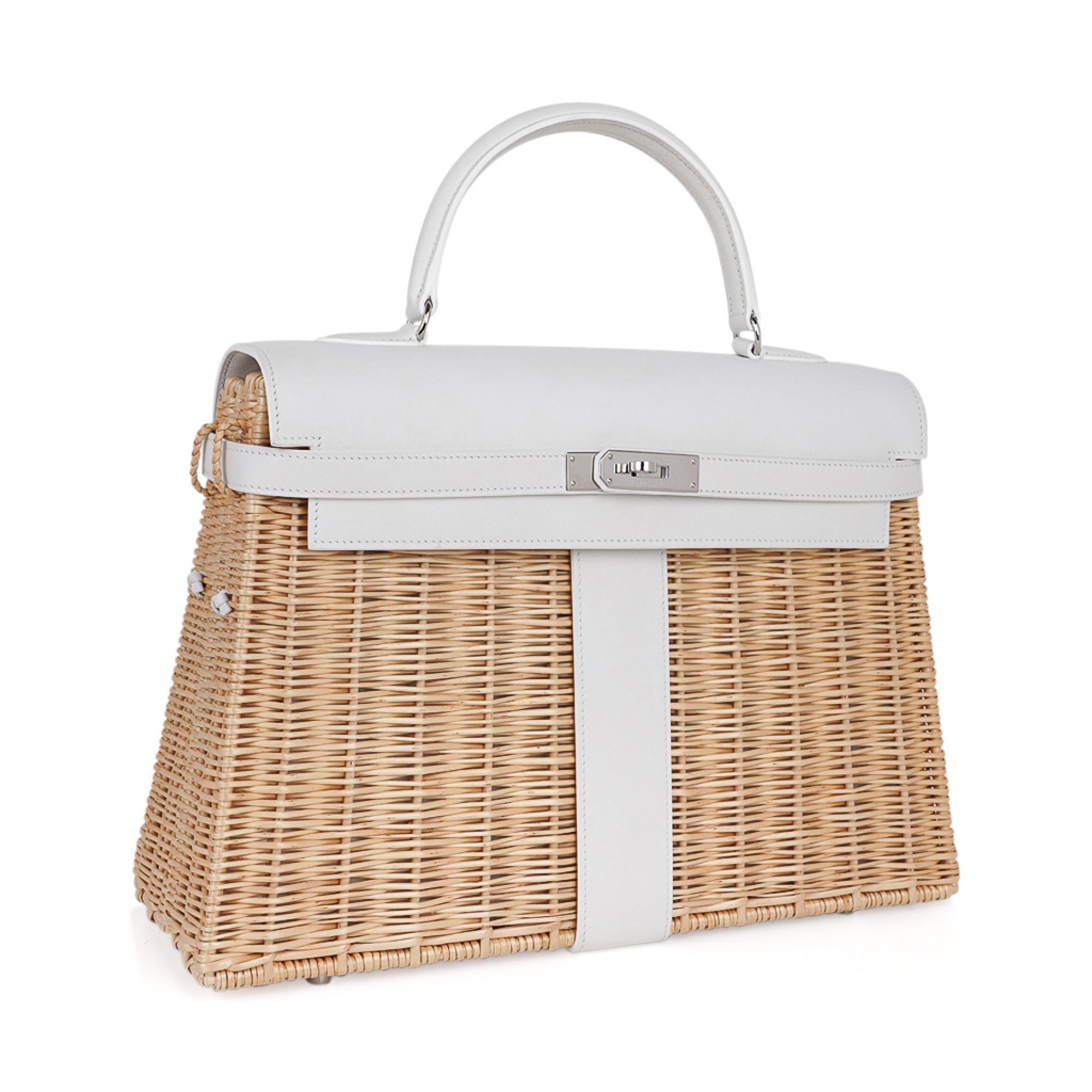 Mightychic offers a Limited Edition Hermes Kelly Picnic bag featured in Osier Wicker and White Swift leather.
This rare collectors bag remains a sought after treasure.
Crisp and fresh with Palladium hardware.
Very like new condition.
Very light
