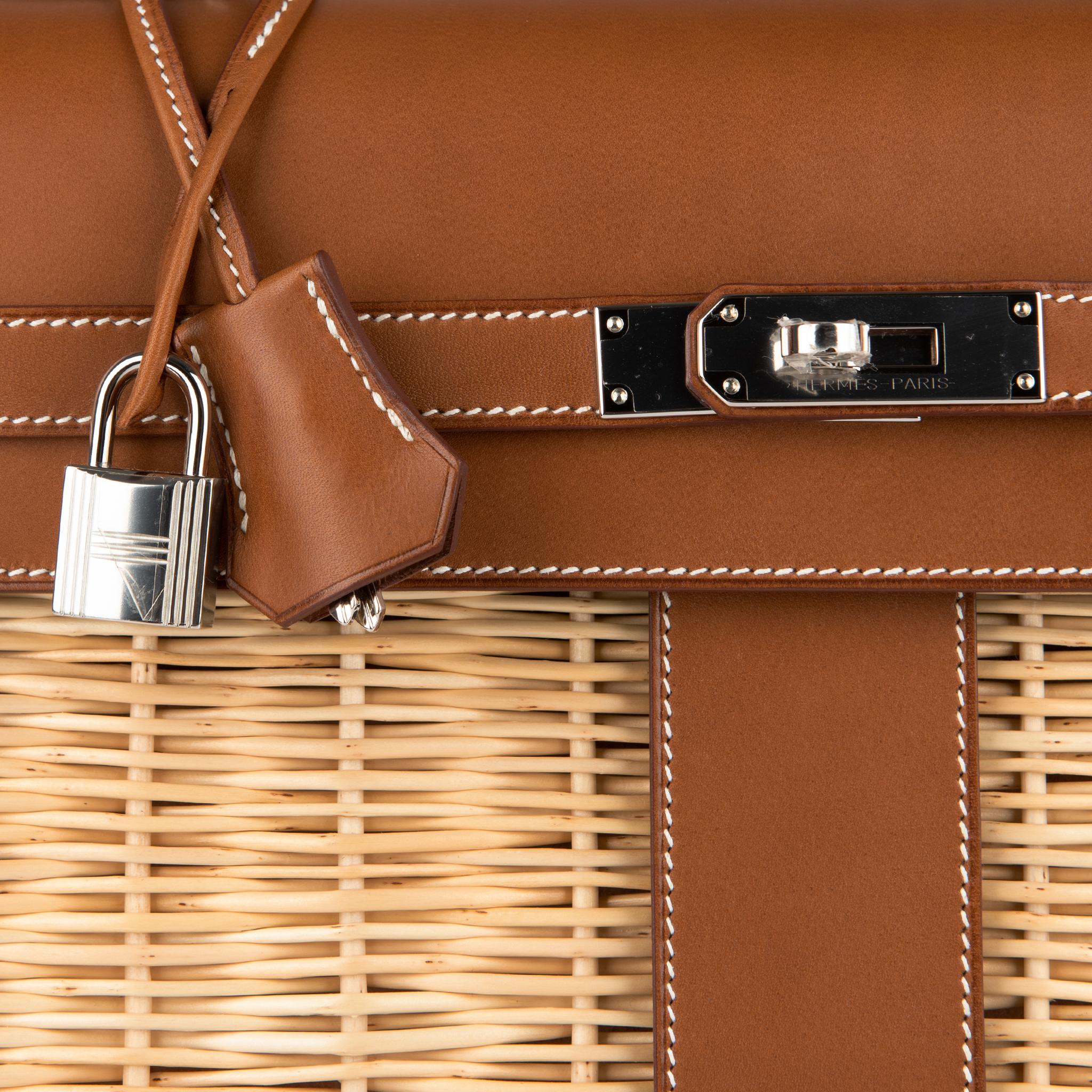 1stdibs Exclusives From Three Over Six

Brand: Hermès 
Style: Kelly Picnic Oiser
Size: 35cm
Color: Fauve
Leather: Barenia and Wicker 
Hardware: Palladium
Stamp: 2019 D

Condition: Pristine, never carried: The item has never been carried and is in