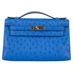 Hermes Kelly Pochette Bag Bleuet Ostrich Clutch Gold Hardware