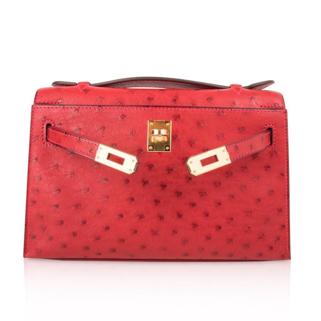Hermes Kelly Pochette Bag Rouge Vif Red Ostrich Clutch Gold Hardware In New Condition In Miami, FL